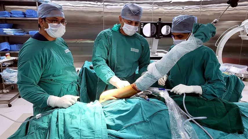 Arthroscopic surgery in progress under theatre lights